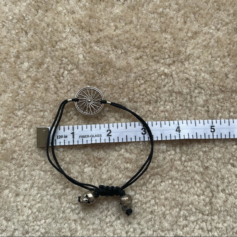 SoulCycle wheel & skull bracelet